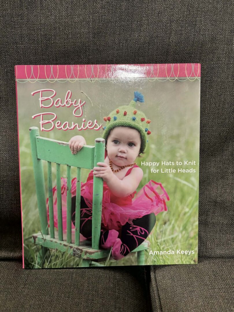 Book: (2008) Baby Beanies: happy little hats to knit for little heads by Amanda Keeys (softcover, 144pp)